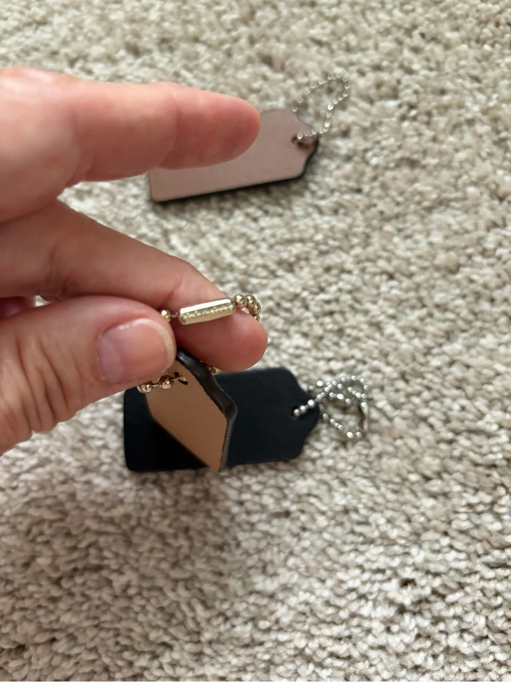 COACH Black and Beige Leather Tag Keychain Trio